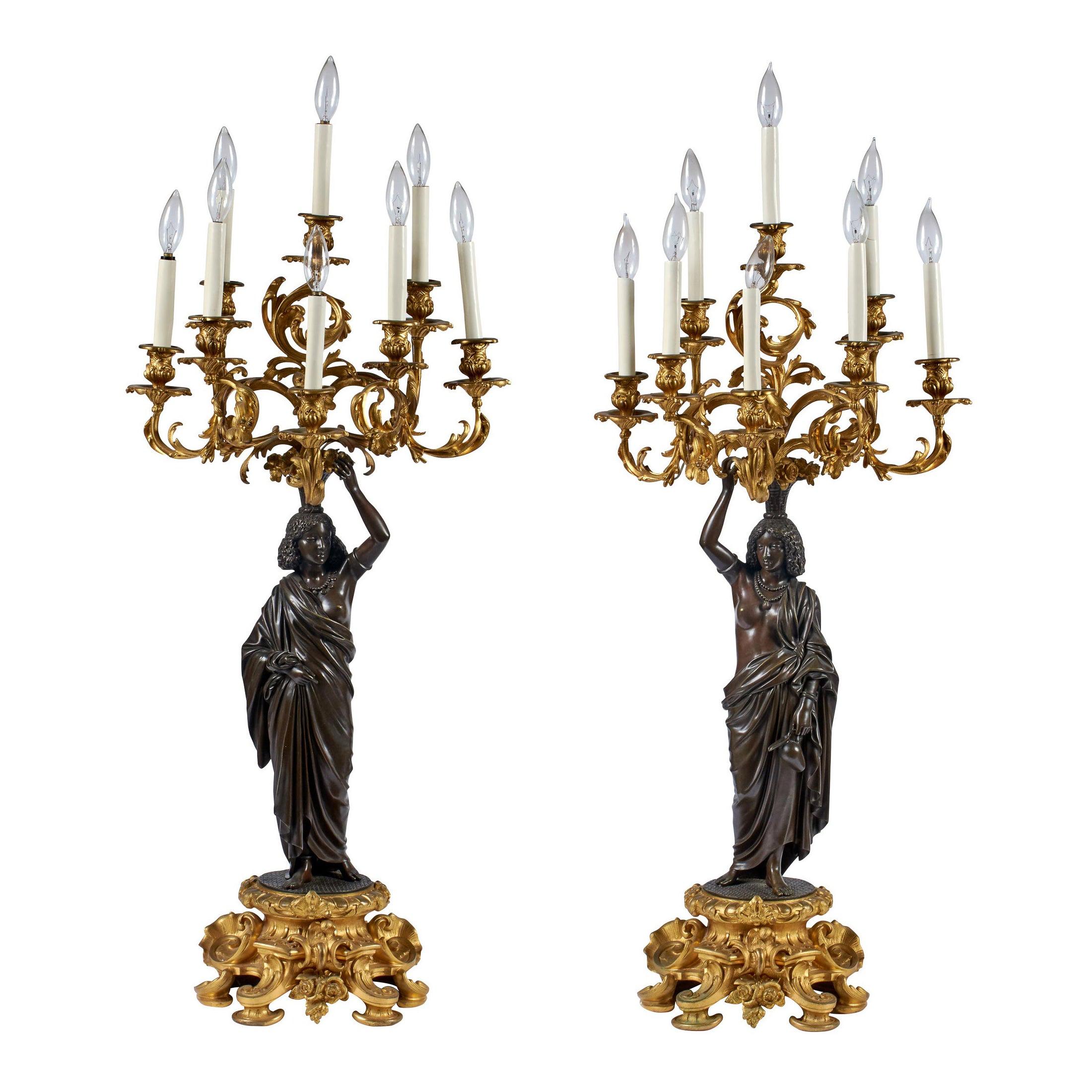 Pair of Ormolu and Patinated Bronze Figural Eight-Light Candelabras For Sale