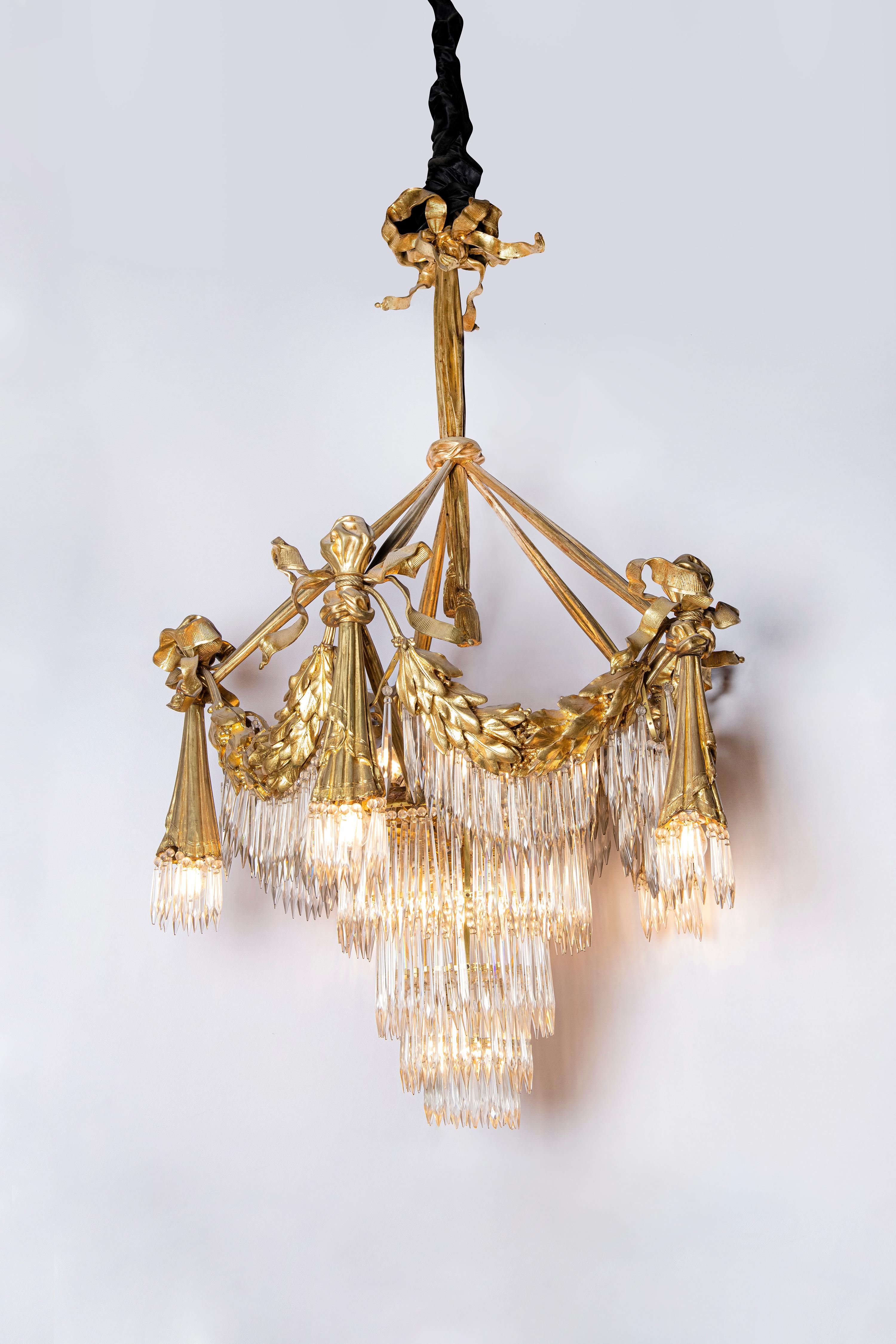 Pair of Ormolu bronze and Baccarat crystal chandeliers, France, circa 1870.

