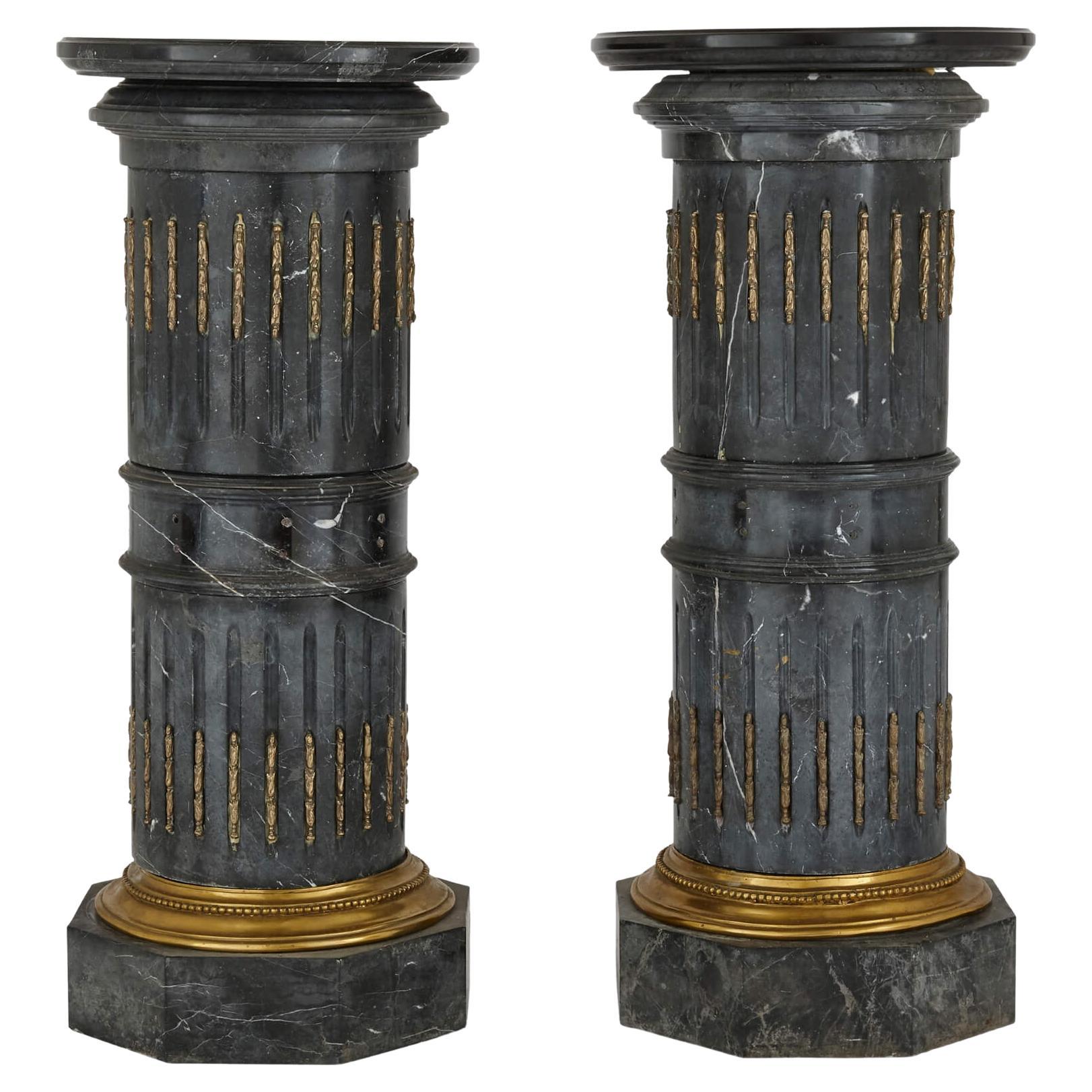 Pair of Ormolu-Mounted Black Marble Pedestals For Sale