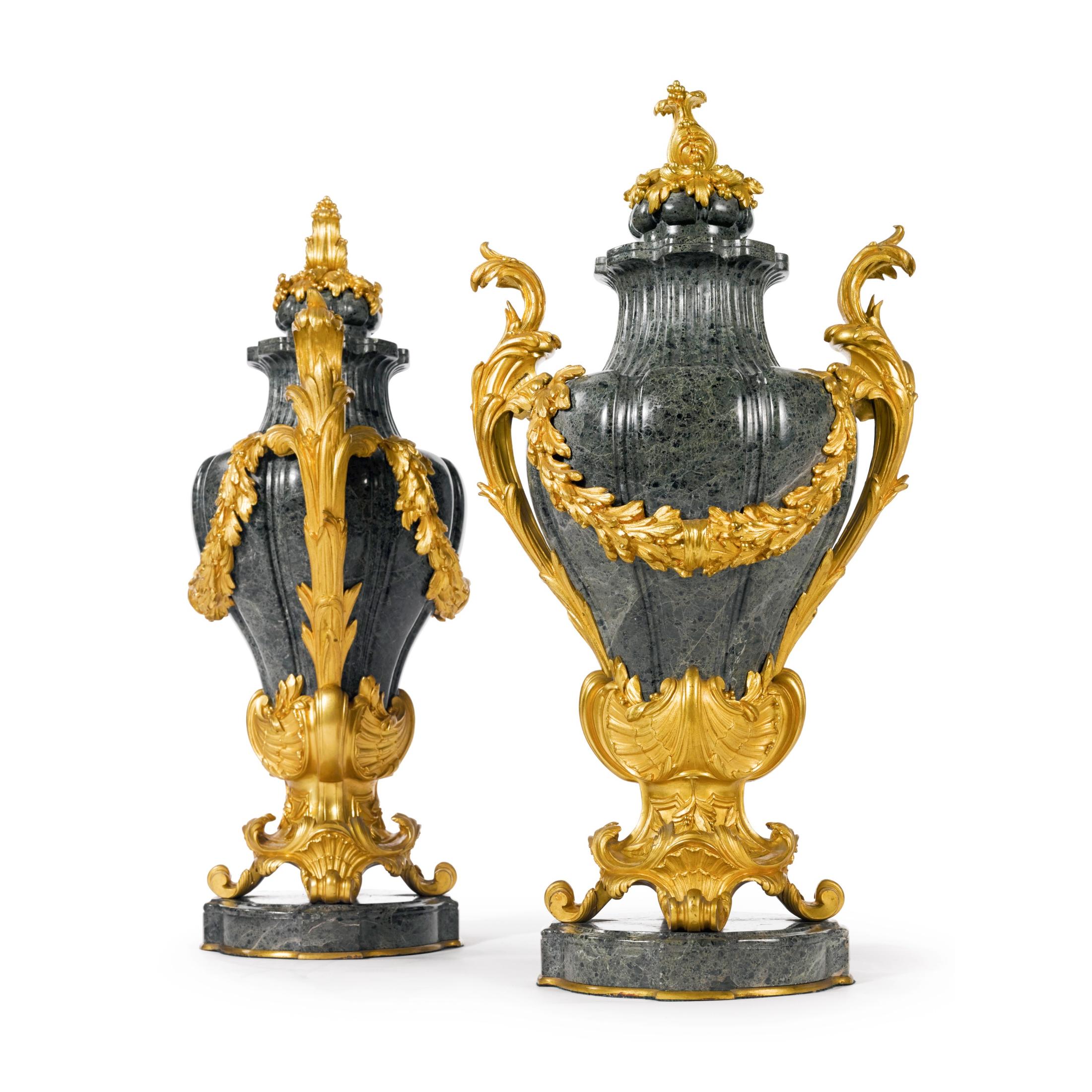 A fine pair of F. Barbedienne gilt bronze-mounted green marble covered vaseseach engraved F. BARBEDIENNE. PARIS

Maker: Ferdinand Barbedienne (1810-1892)
Date: circa 1890
Origin: French
Dimension: 20 1/2 x 10 inches.
  