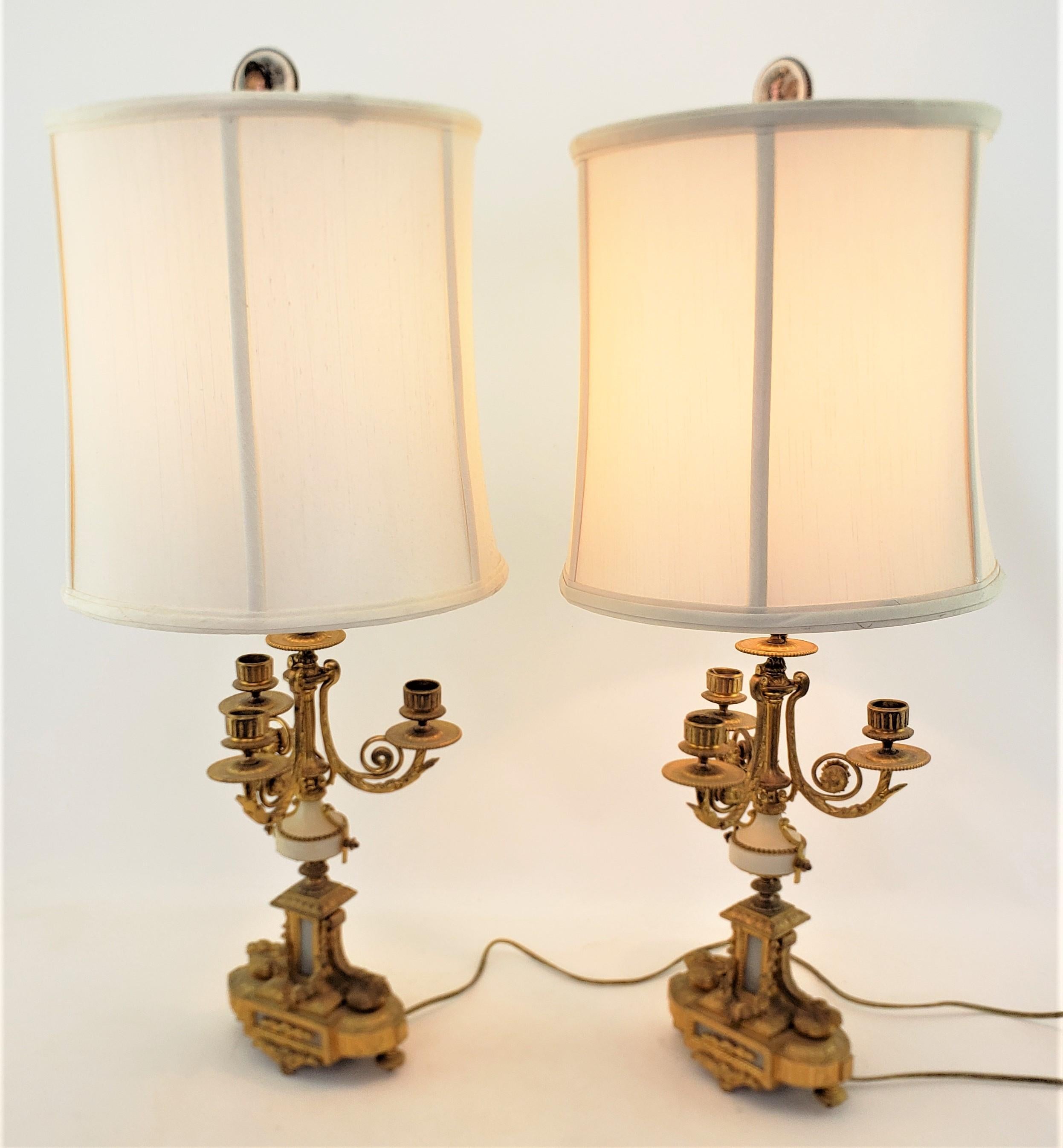 Cast Pair of Ornate Antique French Gilt Bronze Converted Candelabra Table Lamps For Sale