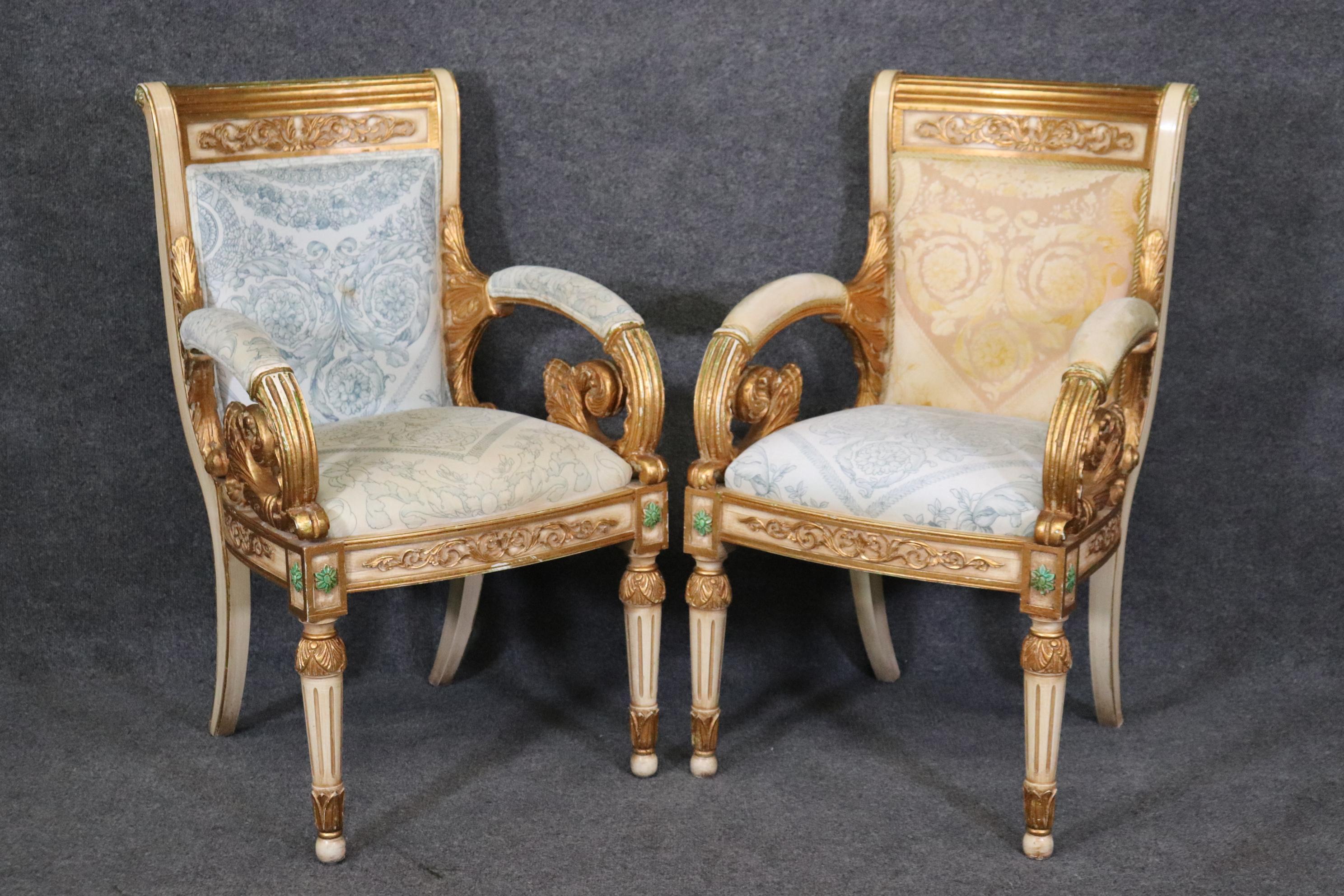 This is a pair, one of two pairs available. This pair has mismatched upholstery and beautiful gold leaf finishes and extraordinary carving and detail. They each measures 36 tall x 21.5 wide x 23 deep and a seat height 19 and date to the 1930s era. 