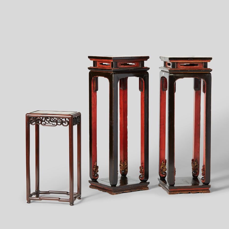 The perfect way to call attention to a plant, special vase or piece of art, these tall display tables date from 1850 during the Qing dynasty. Made of oak, the tables are expertly detailed with elaborate hoof feet and recessed base and tabletop. A