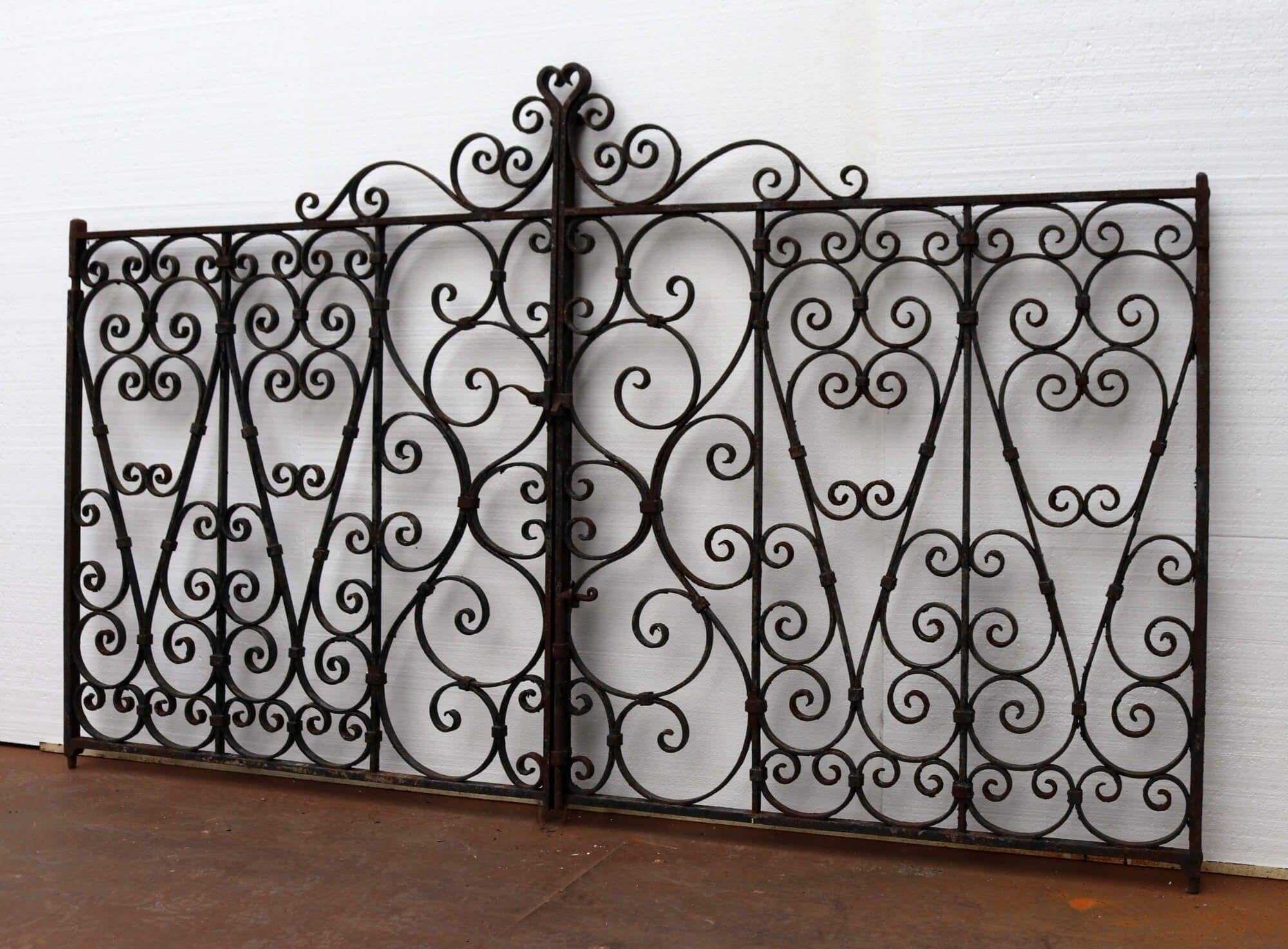Detailed with an abundance of timeless scrollwork, this pair of Edwardian wrought iron gates make a beautiful set of driveway gates.

Alternatively, they could be used as an ornate pair of pedestrian garden gates at the side of a house or at the