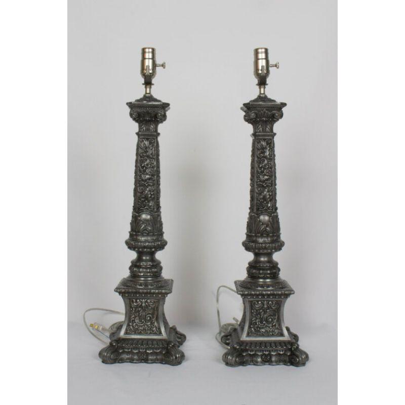 Pair of ornate pewter colored banquet lamps. Cast white metal. American, C. 1940. Completely restored and rewired.

Dimensions: 
Height: 26?
Width: 9?
Depth” 9?.