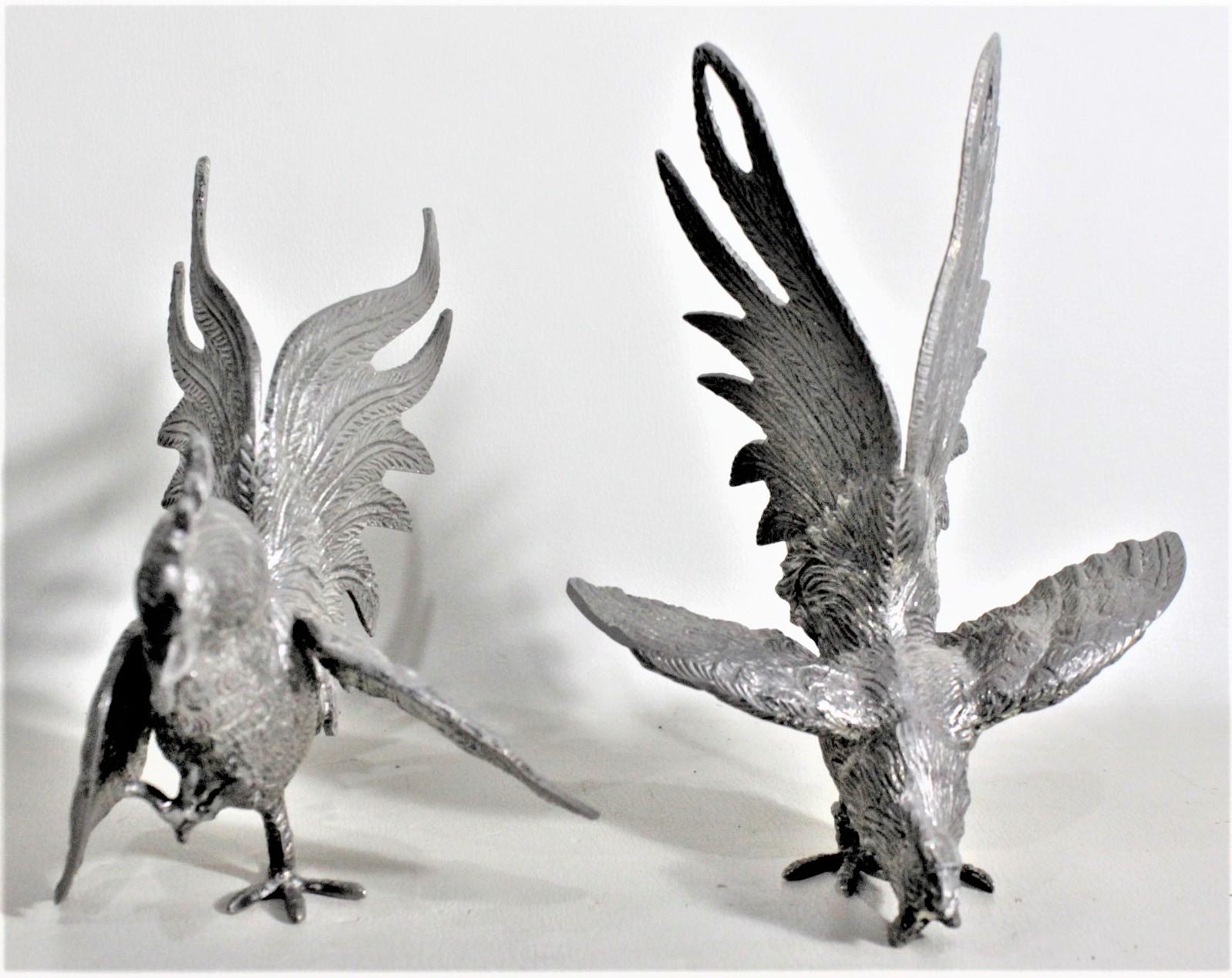 Cast Pair of Ornate Silver Plated Fighting Rooster or Cockerel Table Sculptures For Sale