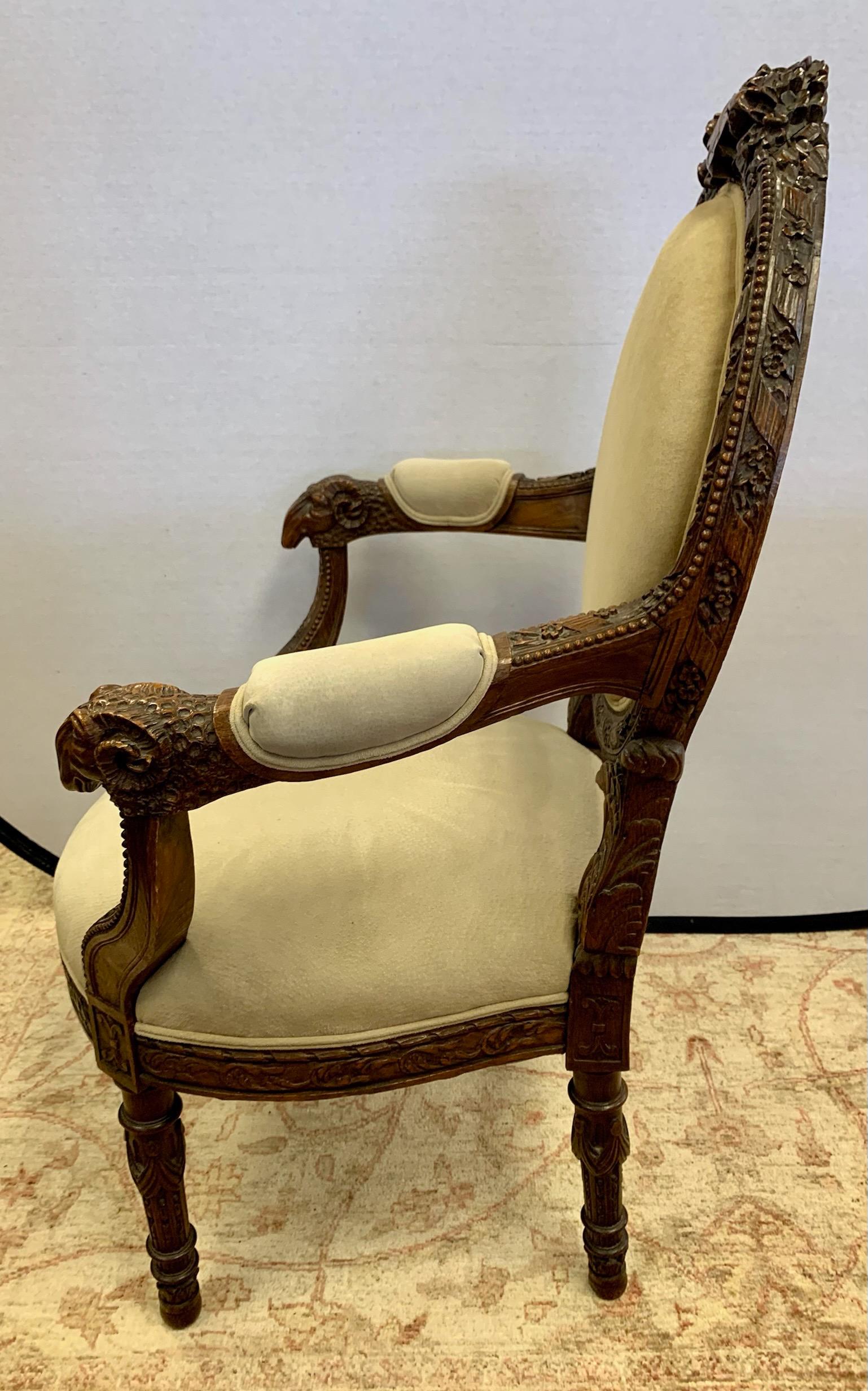 Pair of Ornately Carved Walnut Rams Head Chairs 1