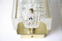 Pareja de candelabros Orrefors de latón y pantallas de cristal de Orrefors, Suecia 1970