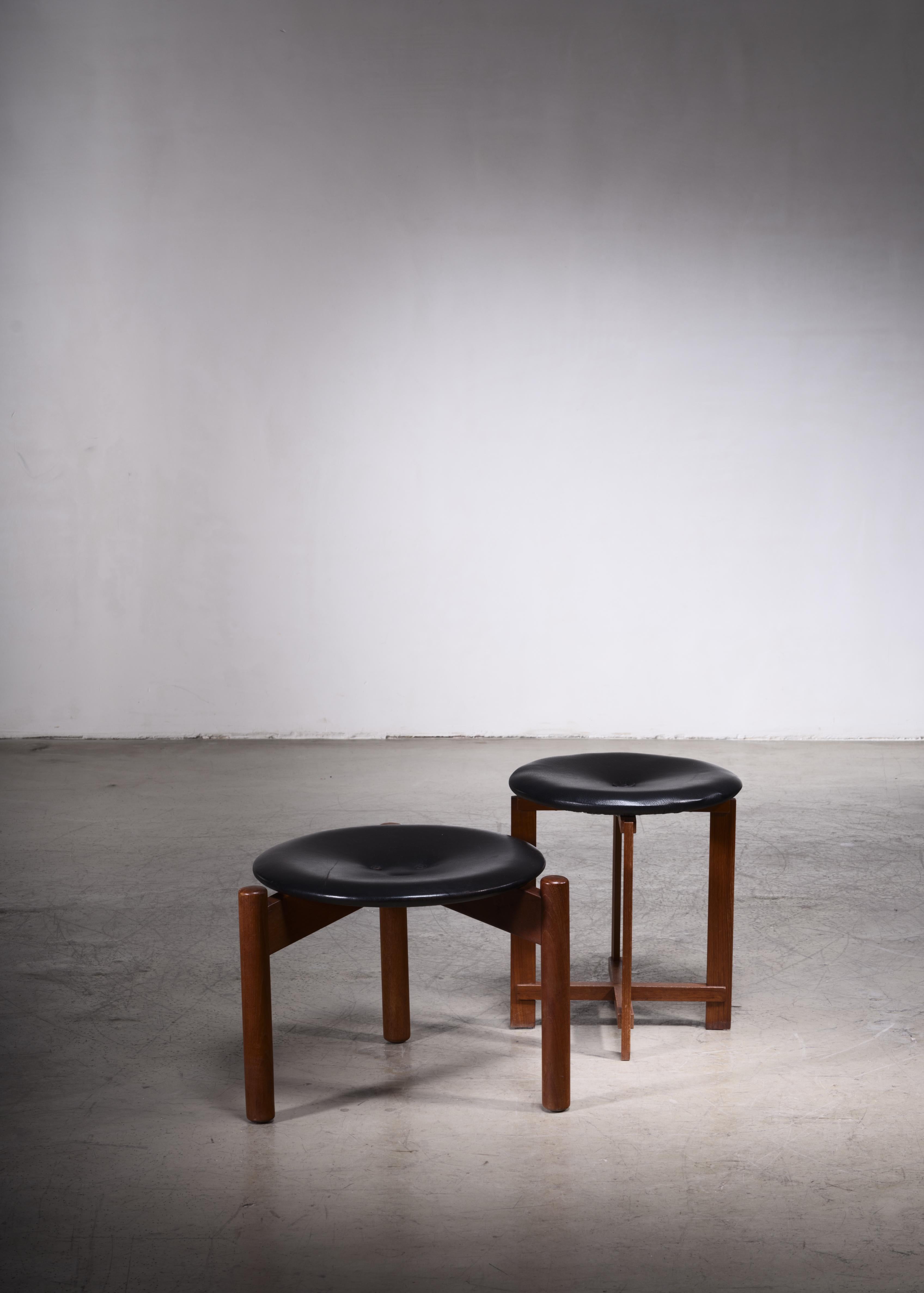 A pair of a high and low Östen and Uno Kristiansson stools for Luxus, Vittsjö, Sweden. The lower stool, model '206' was designed in 1962.
The stools are made of a teak frame, one tripod and one four-legged, with a black leather seatpad.

The