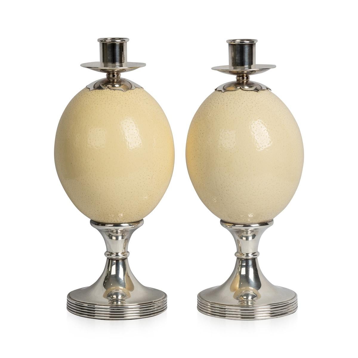 A pair of ostrich egg candlesticks with silver plated mounts by Anthony Redmile. Impressed and signed Redmile London, retailed in his shop and purchased in the 1970s.

Anthony Redmile burst into the London interior design scene in the 1960s,