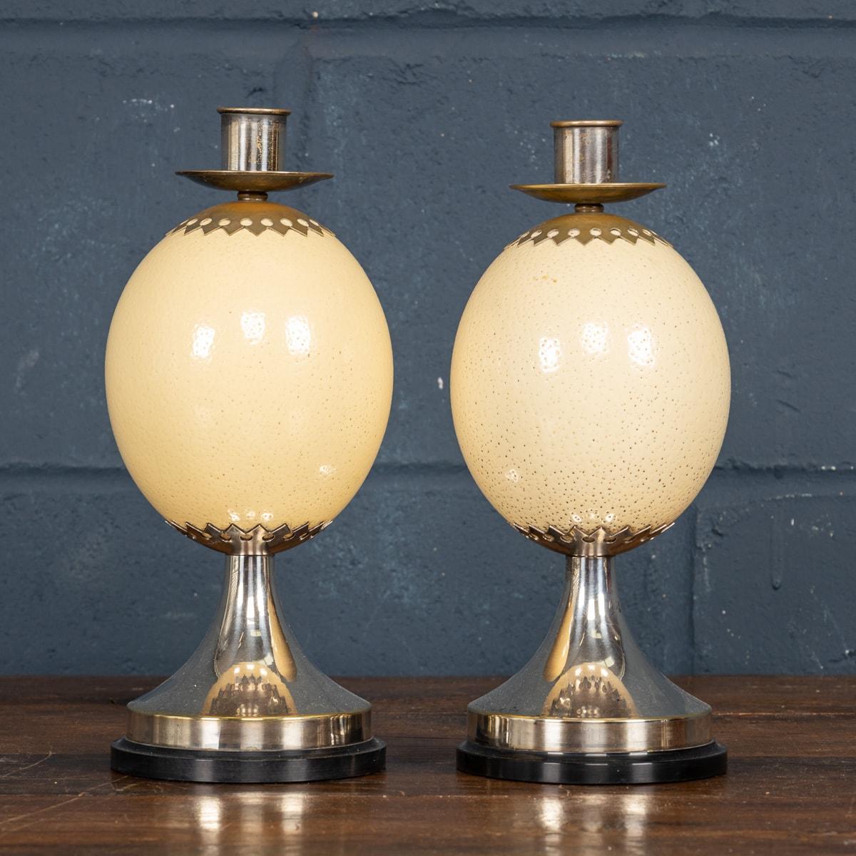 British Pair Of Ostrich Egg Mounted Silver Plate Candlesticks By Anthony Redmile, c.1970 For Sale