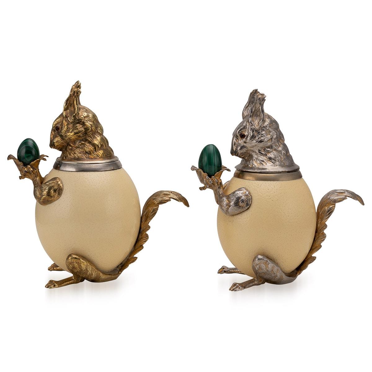 These fantastical squirrels are created by Anthony Redmile, silver plated and gilded heads, feet and tail mounted with an ostrich egg for a body and each holding a solid malachite nut in its paws. Redmiles love of animals and nature come together in