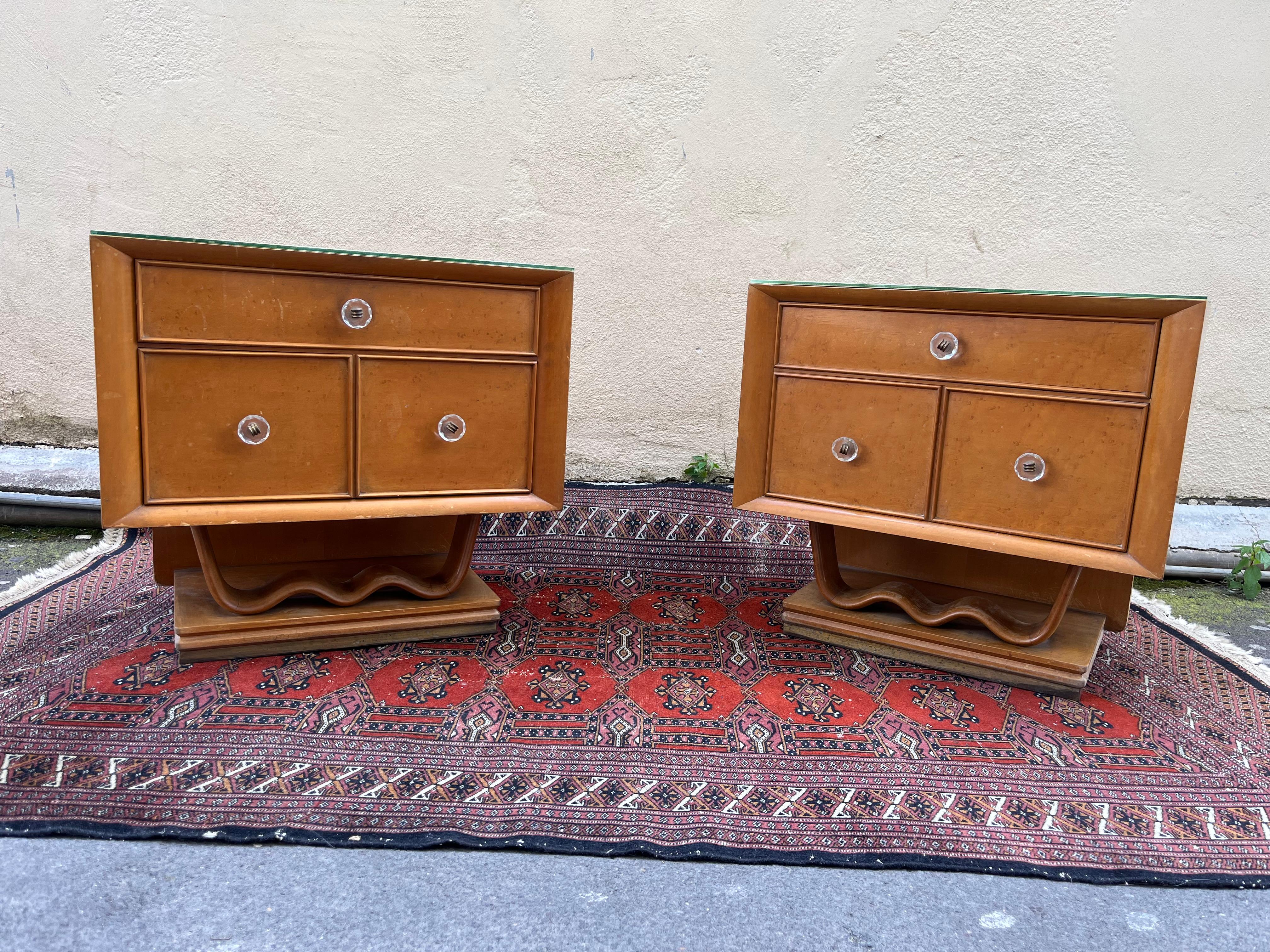 Pair of Osvaldo Borsani style bedside tables from the 60s. A beautiful pair of bedside tables with a refined style, inspired by the famous Italian designer Osvaldo Borsani, a key figure in 20th-century design and a pioneer of modernist style in