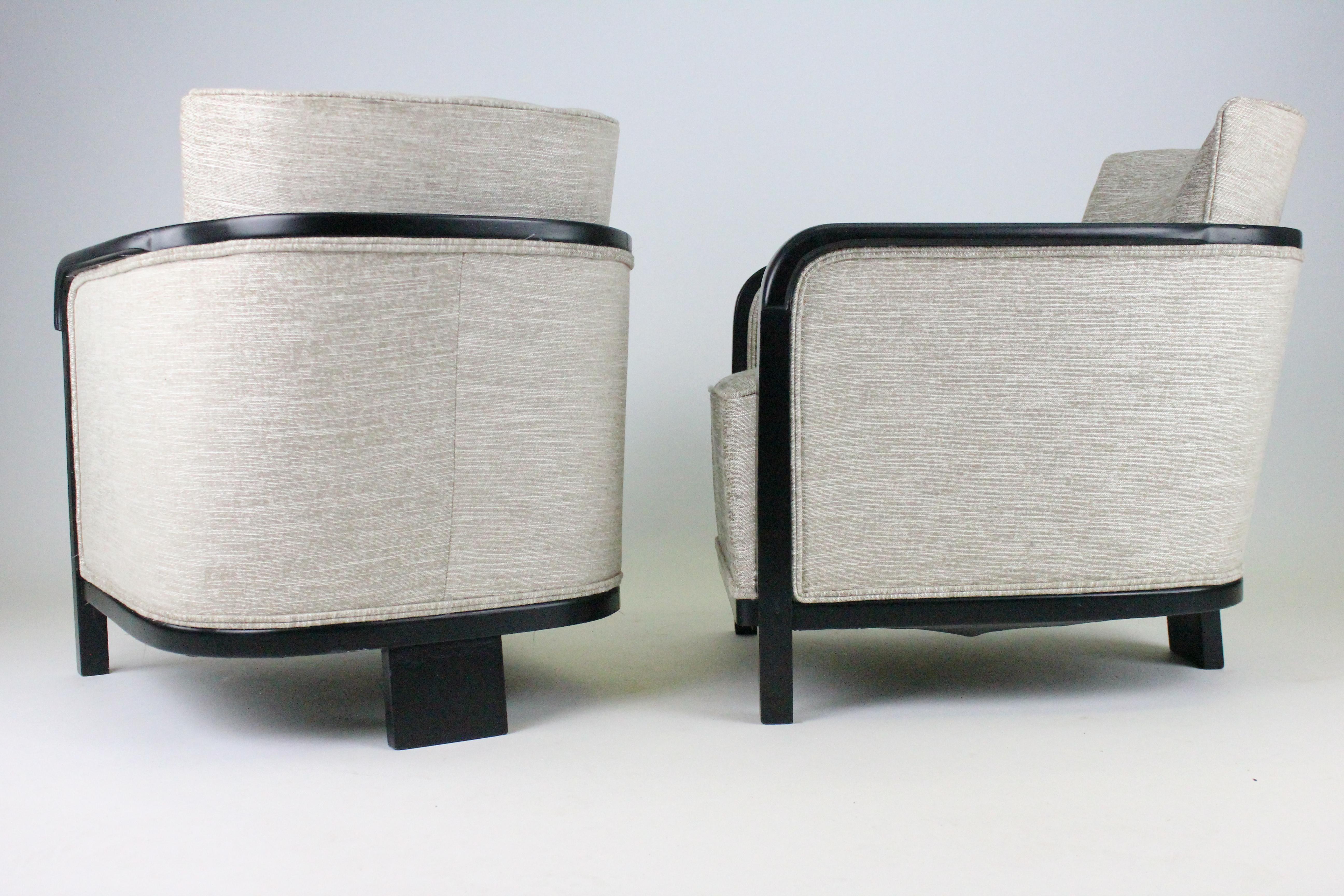 A wonderful pair of Art Deco lounge chairs, designed by Otto Schulz. Extraordinary design with two front legs and only one leg at the back. Really comfortable to sit in. With its design, they really make a statement. Newly upholstered and restored.