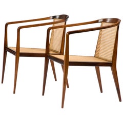 Paire de chaises longues en bois de Caviona avec assise et dossier en rotin par John Graz, années 1960