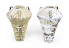 Pair of Outdoor Cast Iron Urns with Beige and Brown Patina