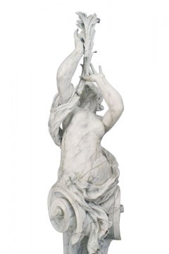 Paire de statuettes féminines en fer pour l'extérieur