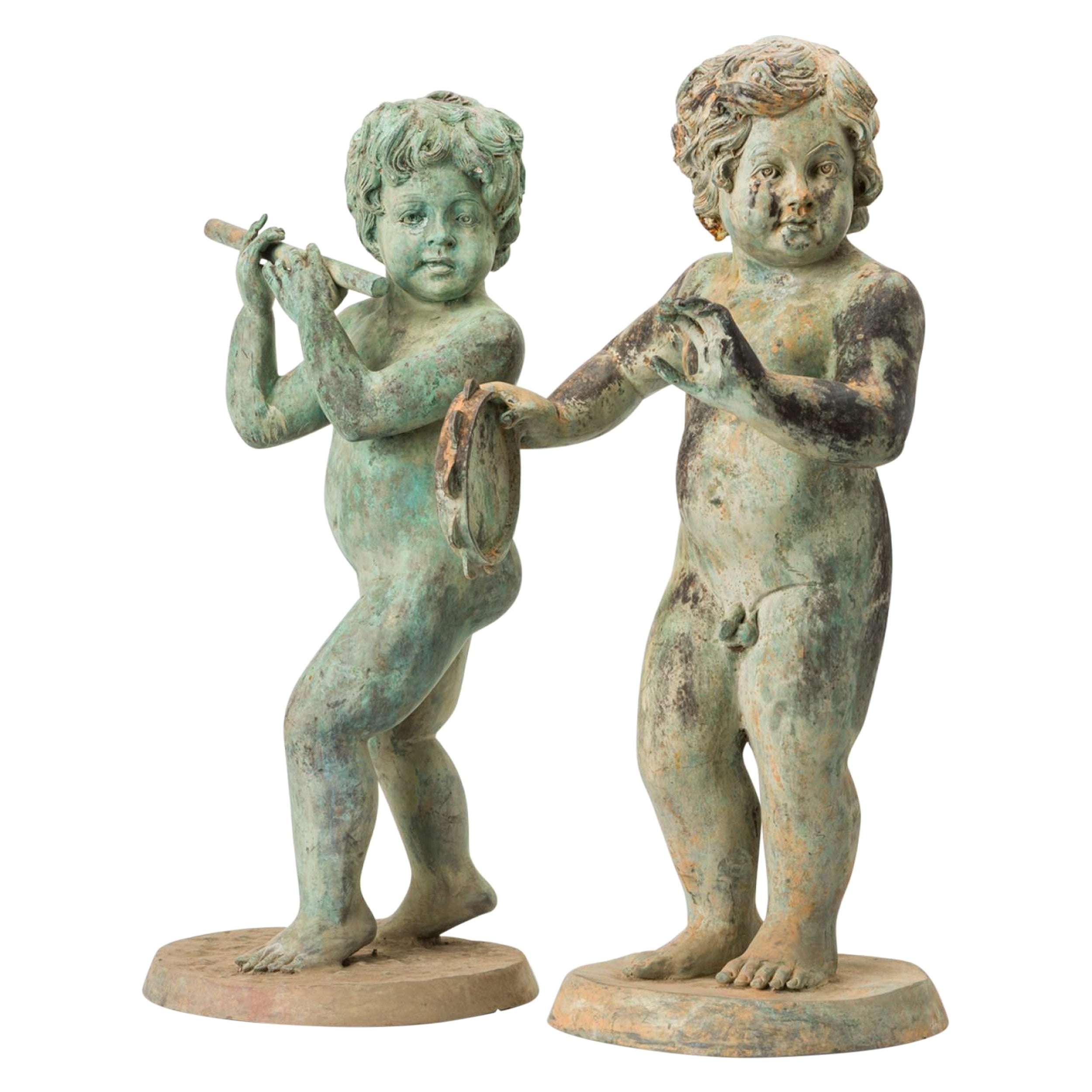 Pair of Outdoor Neo-Classical Natural Patina Iron Flute and Tambourine-Playing