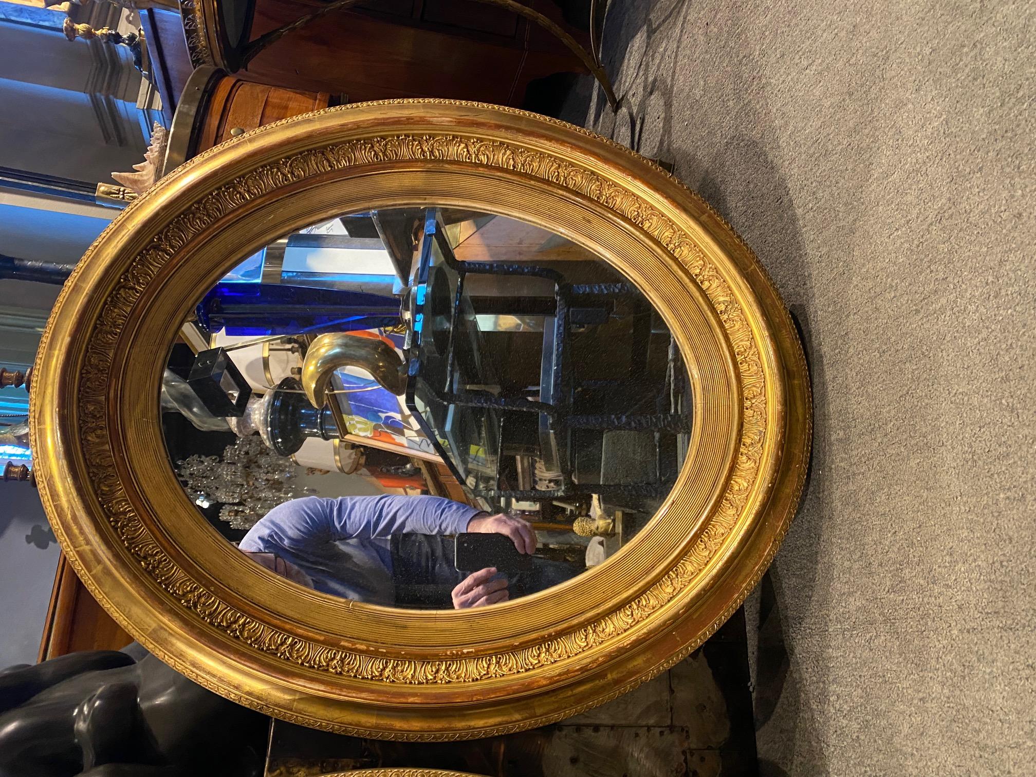 Gilt Pair of Oval English Gold Leaf Mirror For Sale