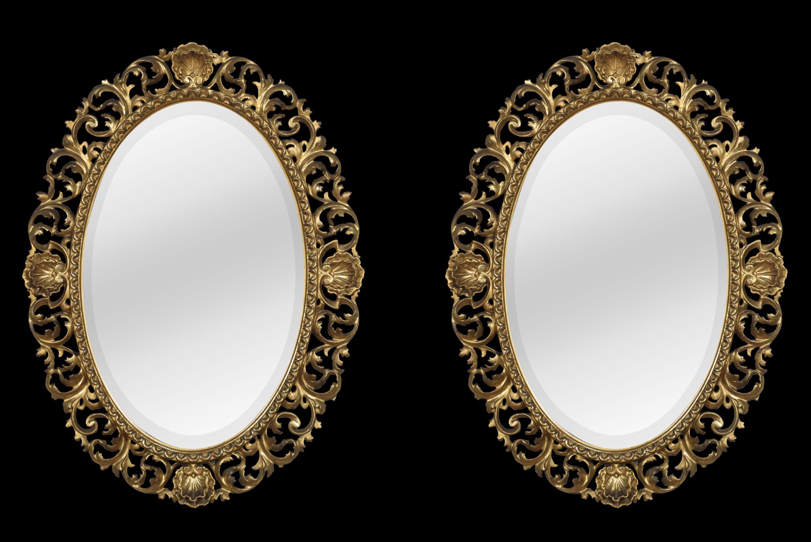 Pair of oval giltwood wall mirrors, with carved scallop and pierced scrolling acanthus border. Surrounding the original bevelled mirror plate.
Dimensions
Height 22 inches
Width 29.5 inches
Depth 1.5 inches.