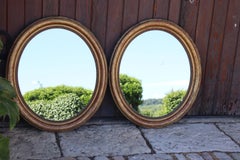 Pair Of Oval Gilded Wooden Mirrors From The Louis Philippe Period