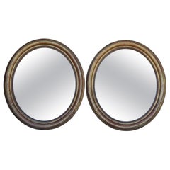Pair Of Oval Gilded Wooden Mirrors From The Louis Philippe Period