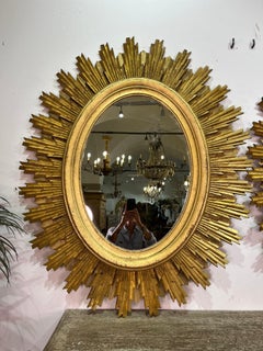 Pair of Oval gilt wood sunburst mirror
