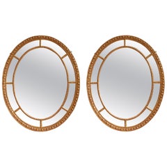 Pair of Oval Giltwood Mirrors
