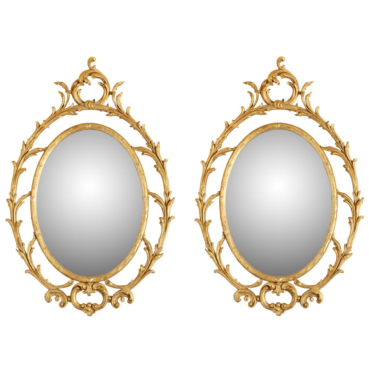 Pair of Oval Giltwood Mirrors With Scroll Motif In Good Condition For Sale In Locust Valley, NY