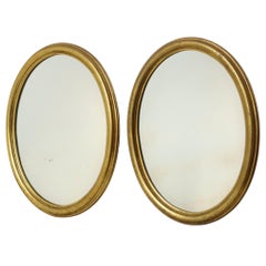 Pair of Oval Gold-Leaf Mirrors, France, 20th Century
