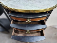 Pair of Oval Mahogany End Tables