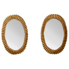 Paire de miroirs ovales en verre de Murano par Studio Glustin