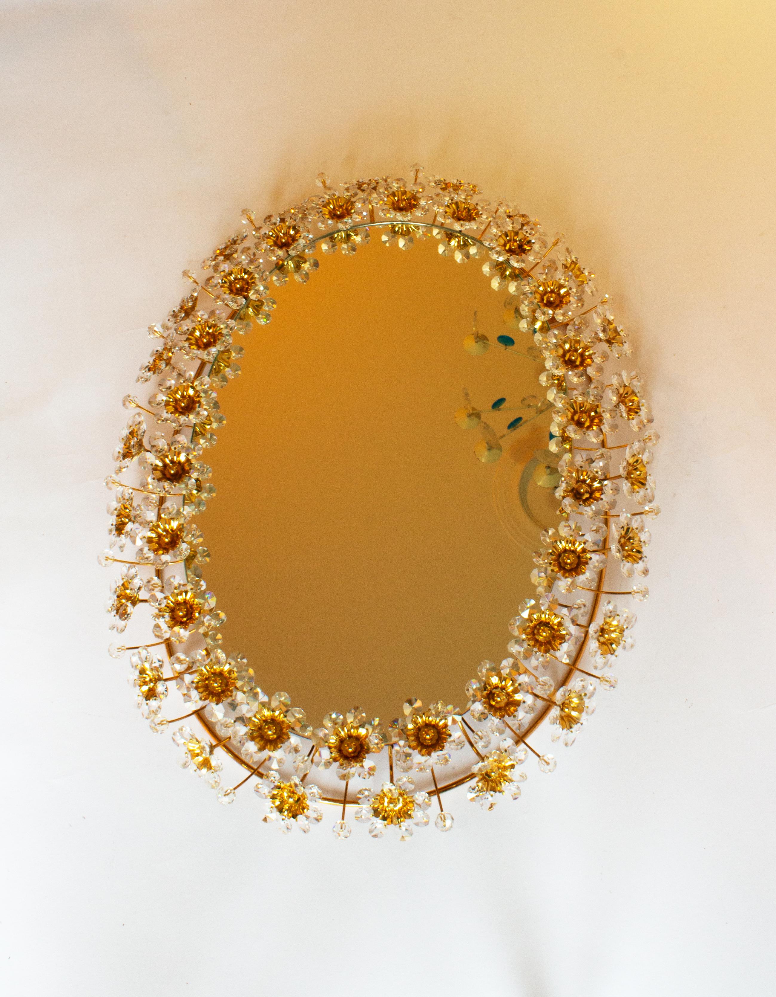 Hollywood Regency Pair of Oval Palwa Backlight Mirrors with Guilt Brass and Crystal Flowers For Sale