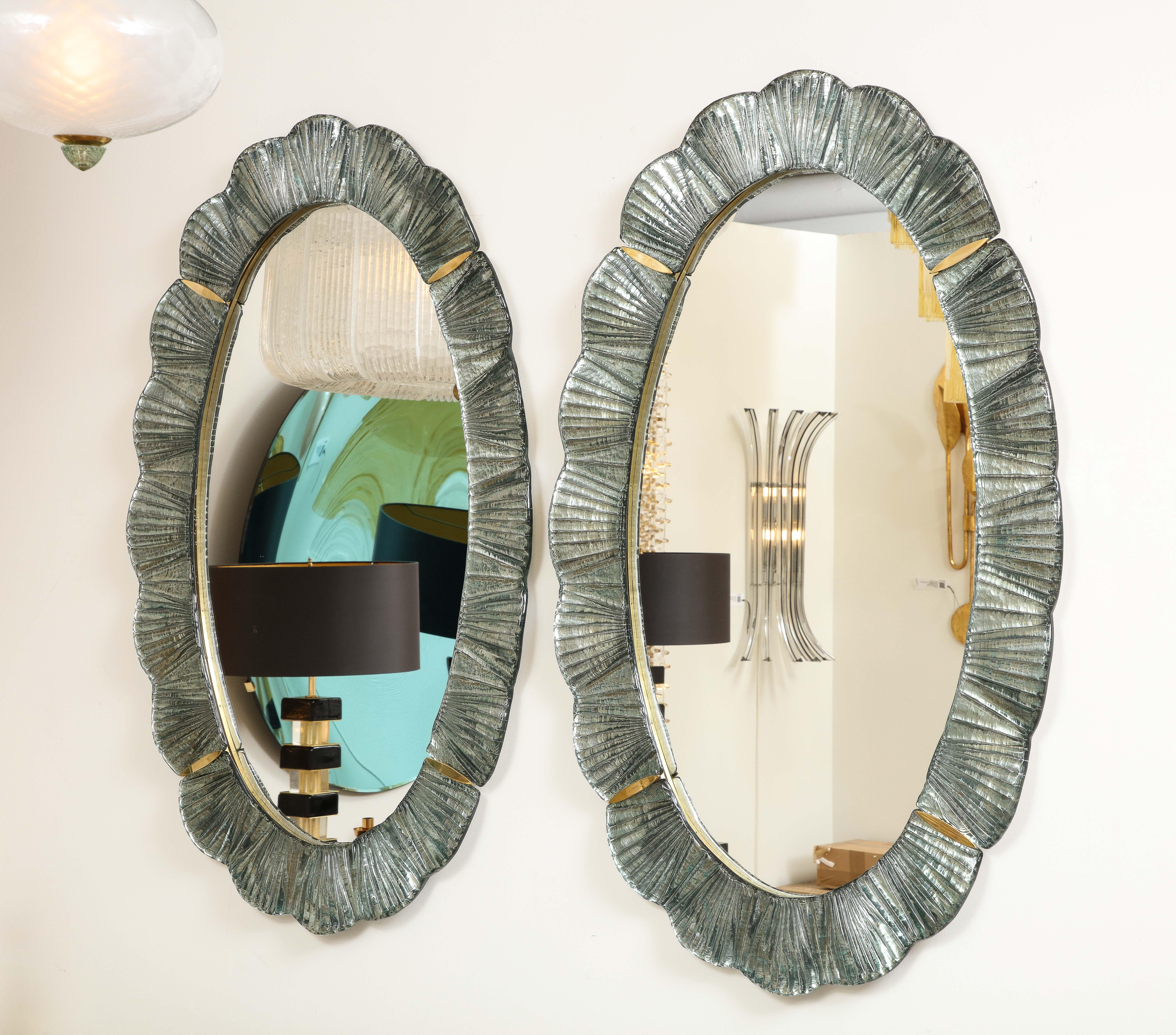 Contemporary Pair of Oval Scalloped Murano Glass and Brass Mirrors in Soft Blue Green, Italy