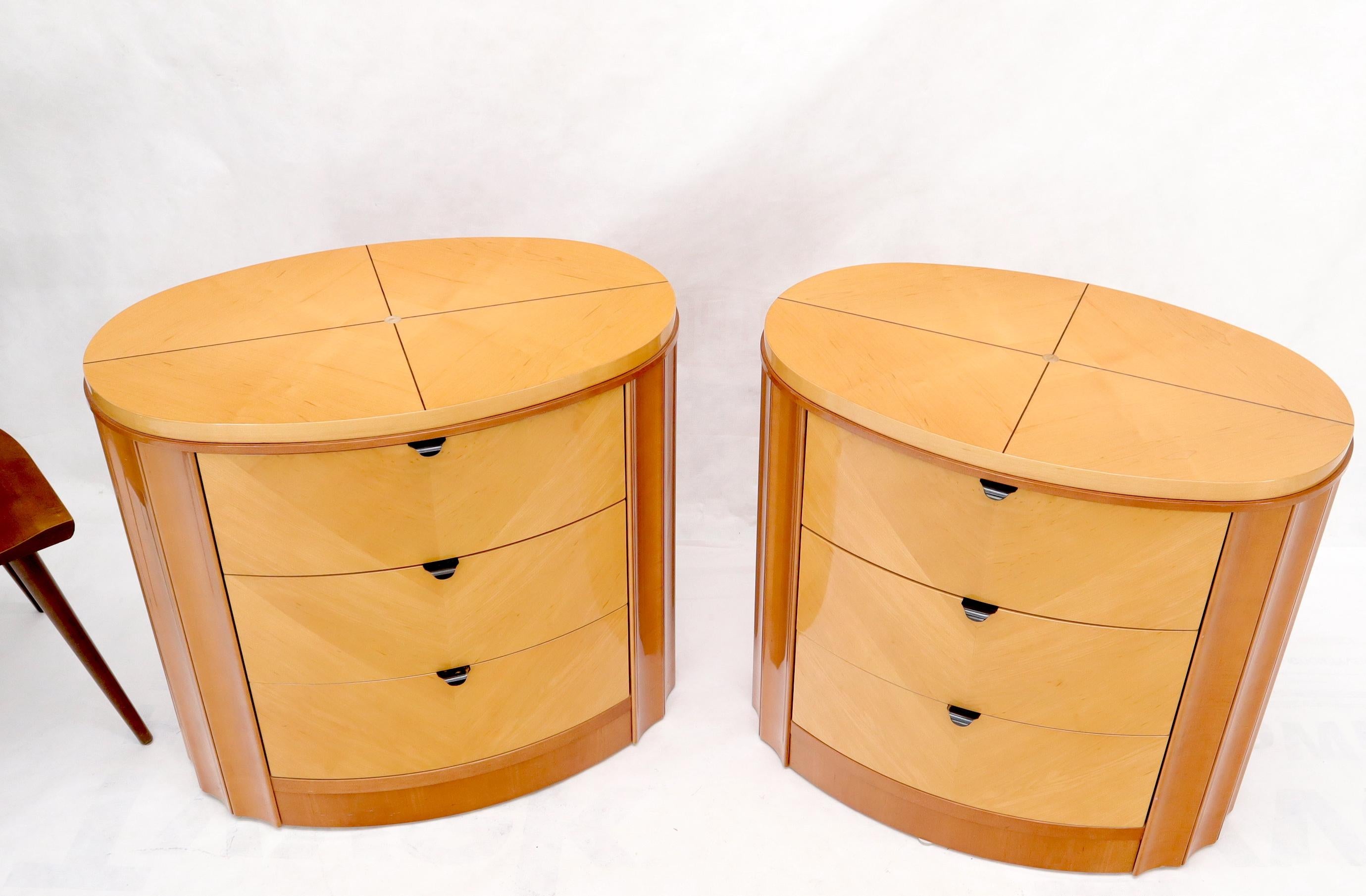 Pair of Mid-Century Modern oval three drawers inlaid tops nightstands. Made in Spain.