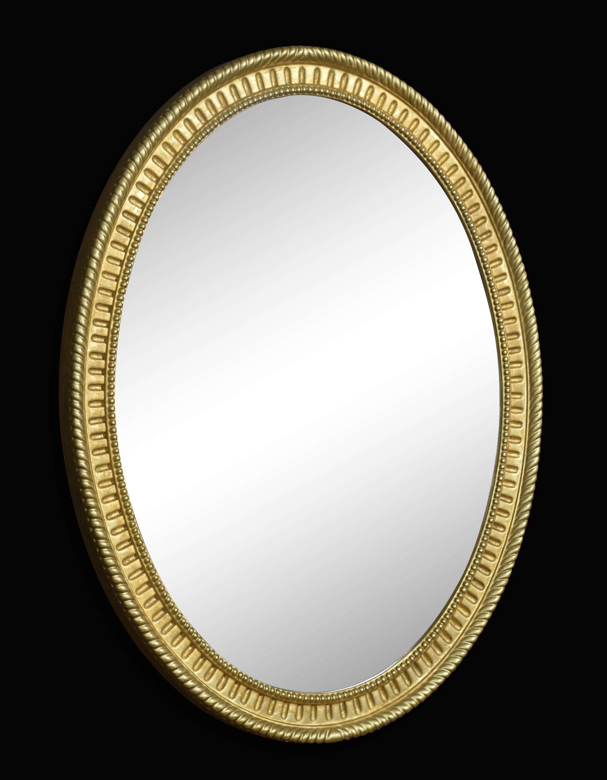 British Pair of oval wall mirrors For Sale