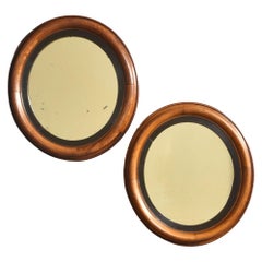Pair of oval wall mirrors Pair of oval wall mirrors