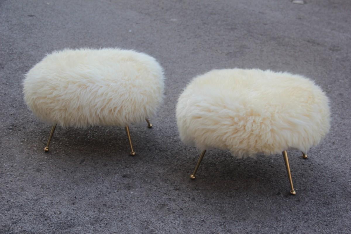 Pair of stools in sheep Mid-Century Modern Italian design brass feet 1950,
the sheepskin was put on by us, the structure of the stool with the feet is original of 1950. Unique and elegant combination of great value, suitable for a house with a lot