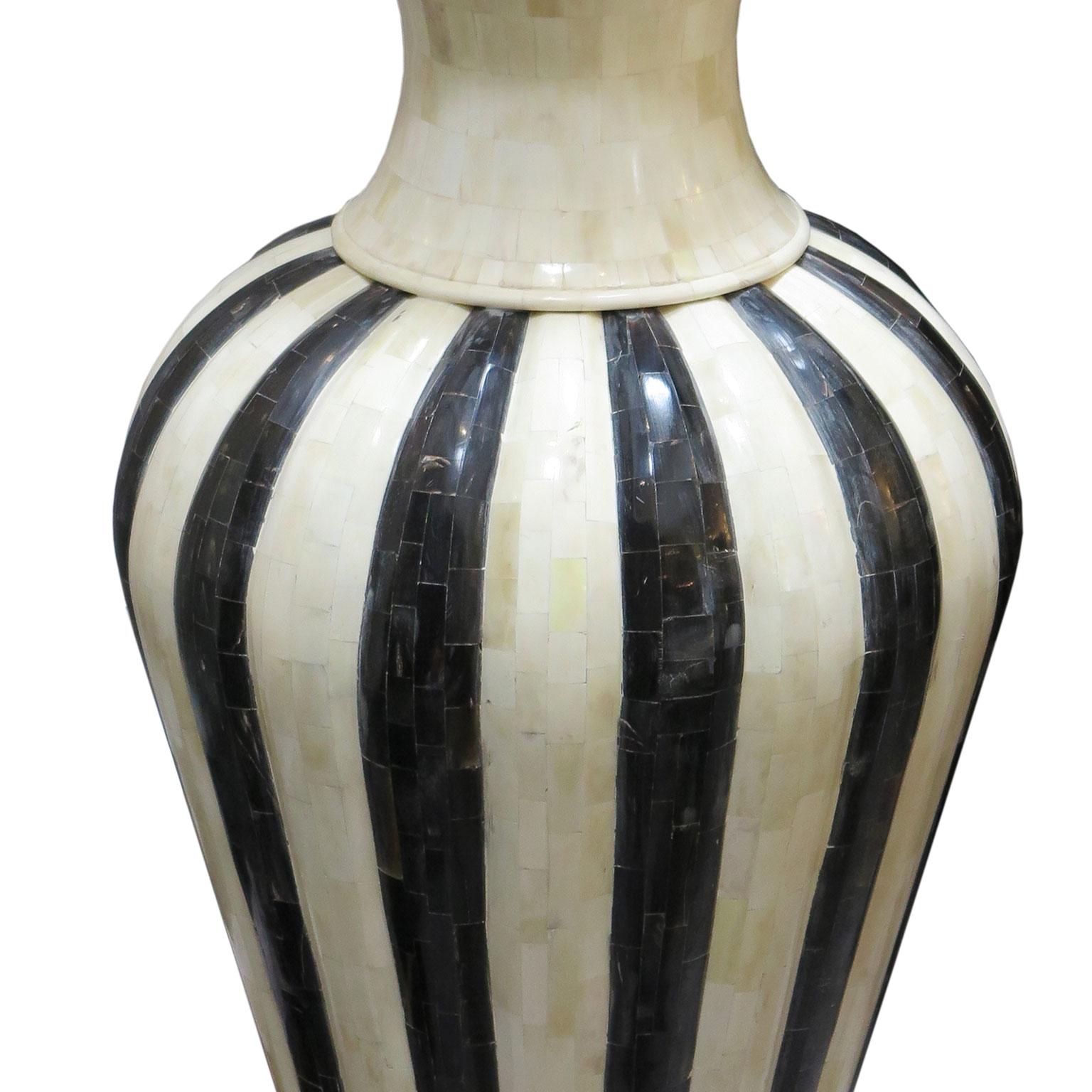 Pair of oversized vases with tapered body in alternating Horn and bone stripes. Neck and rim of vases in bone only. 
Ideal for a large sideboard or even to place on the floor.