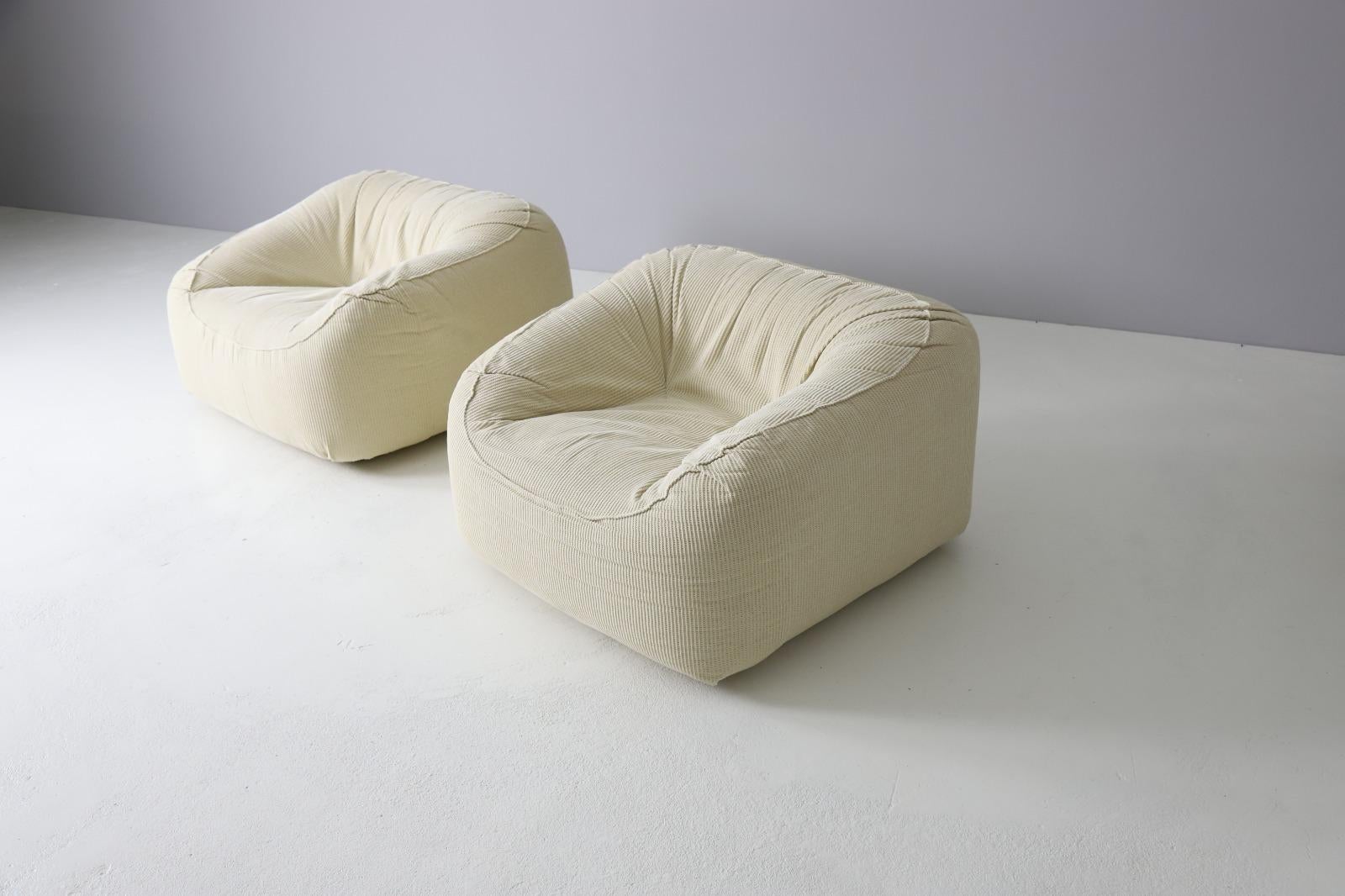 Pair of oversized Italian lounge chairs from the late 1970s. All in very good original condition. The moulded foam base makes it super comfortable. 
Original fabric with minimal wear of use and age.