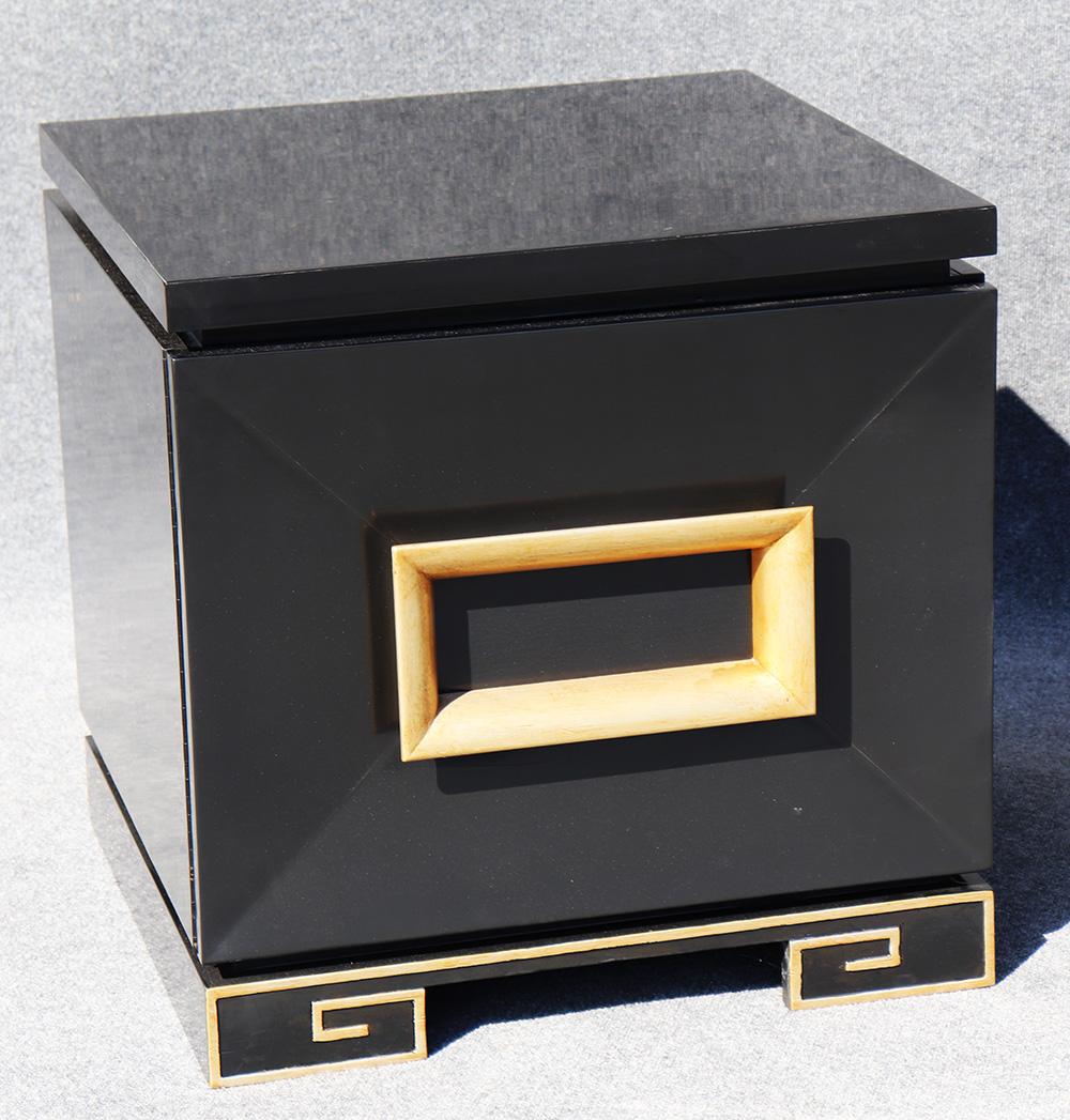 Pair of James Mont style Mid-Century Modern black lacquer nightstands with gold leaf accents and each has 1 shelf.