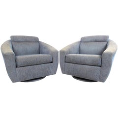 Pair of Oversized Modern Swivel Lounge Chairs