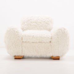 Pair of Oversized Off-White Faux Goatskin Chairs
