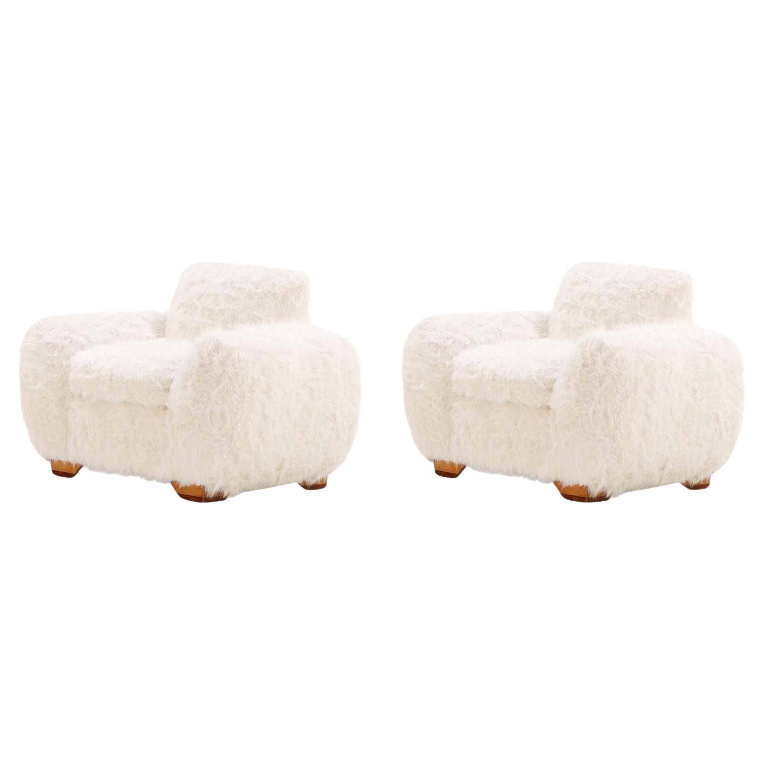 Pair of Oversized Off-White Faux Goatskin Chairs