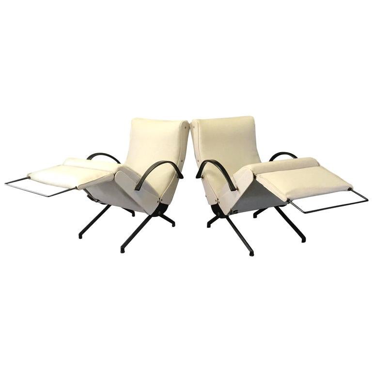 Early edition set of two P40 lounge chairs by Osvaldo Borsani for Tecno.
The lounge chair P40 was designed by Osvaldo Borsani of Tecno is an icon of 1950s Italian design.
The chair can be adjusted in over 40 positions.
The back can be reclined in