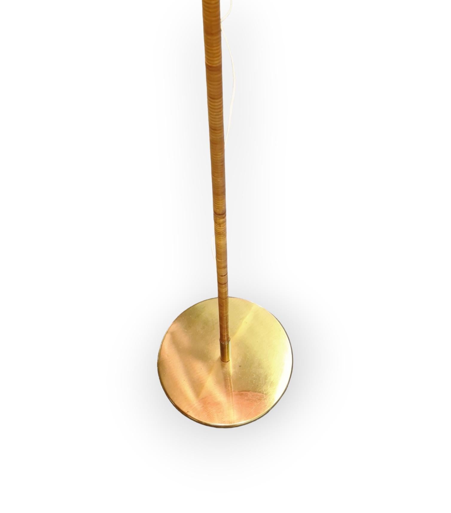 Brass Pair of Paavo Tynell Floor Lamps Model 9602 