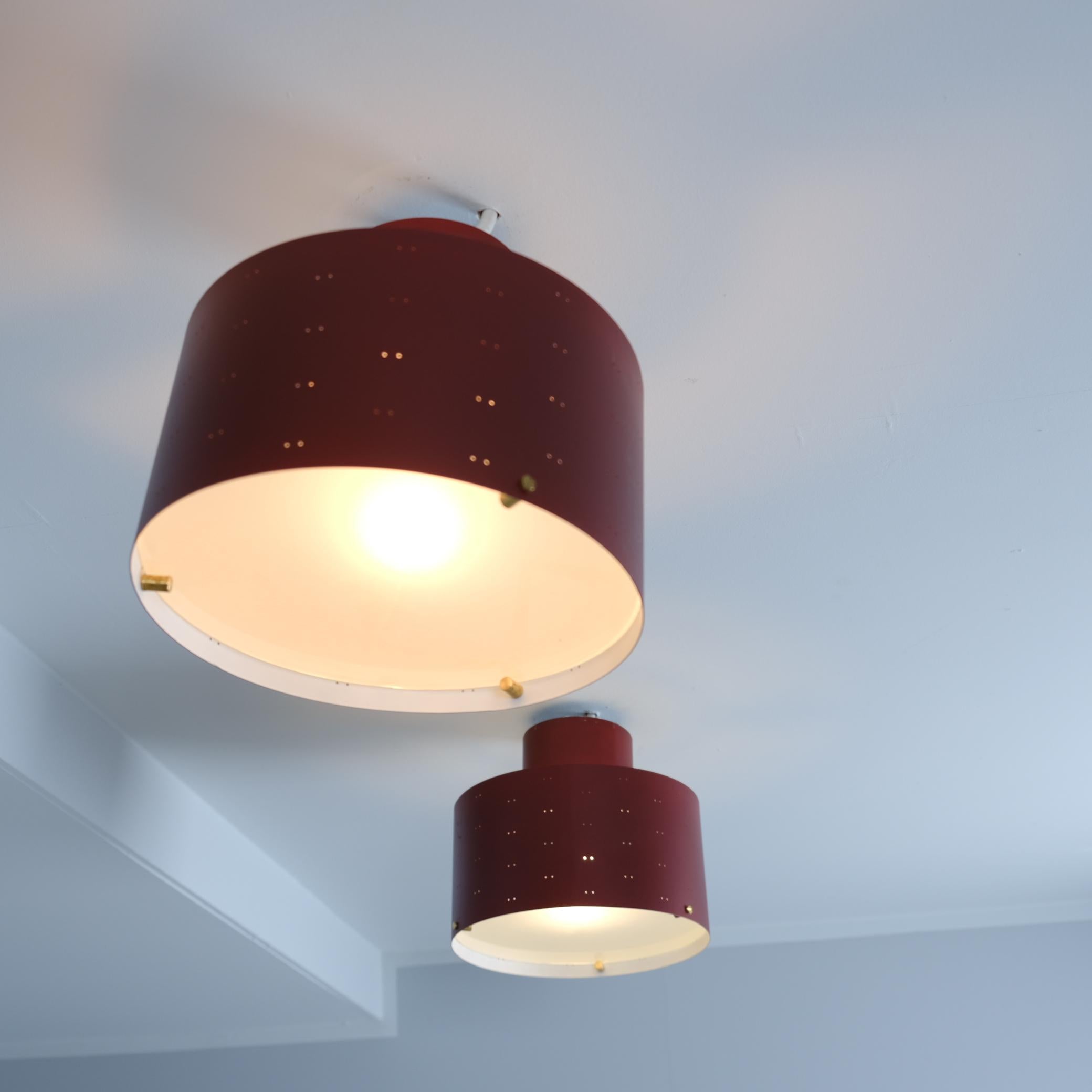Mid-Century Modern Pair of Paavo Tynell Round Starry Sky Ceiling Lamps 9069, Burgundy, Idman 1950s For Sale