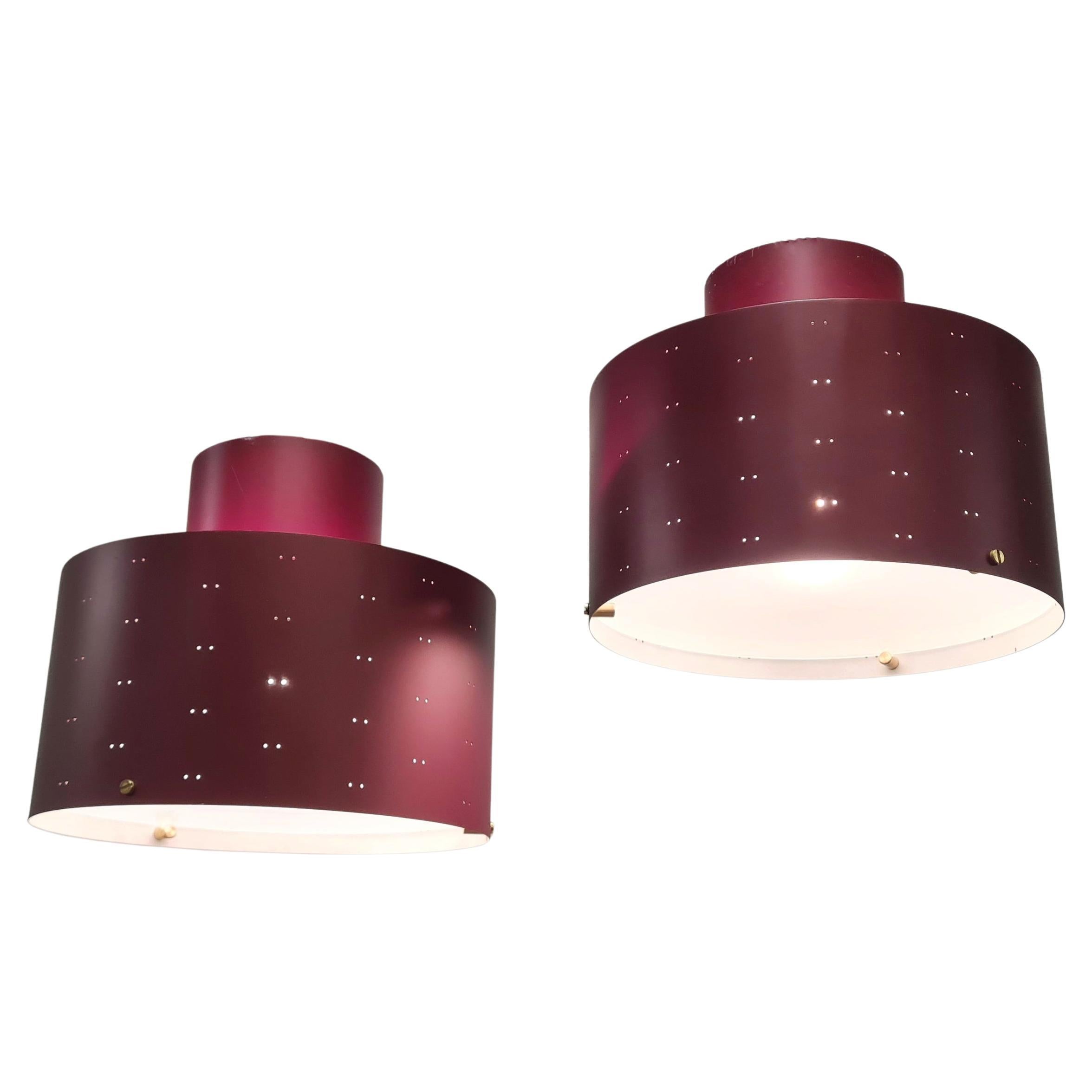 Pair of Paavo Tynell Round Starry Sky Ceiling Lamps 9069, Burgundy, Idman 1950s