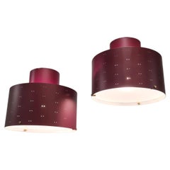 Pair of Paavo Tynell Round Starry Sky Ceiling Lamps 9069, Burgundy, Idman 1950s