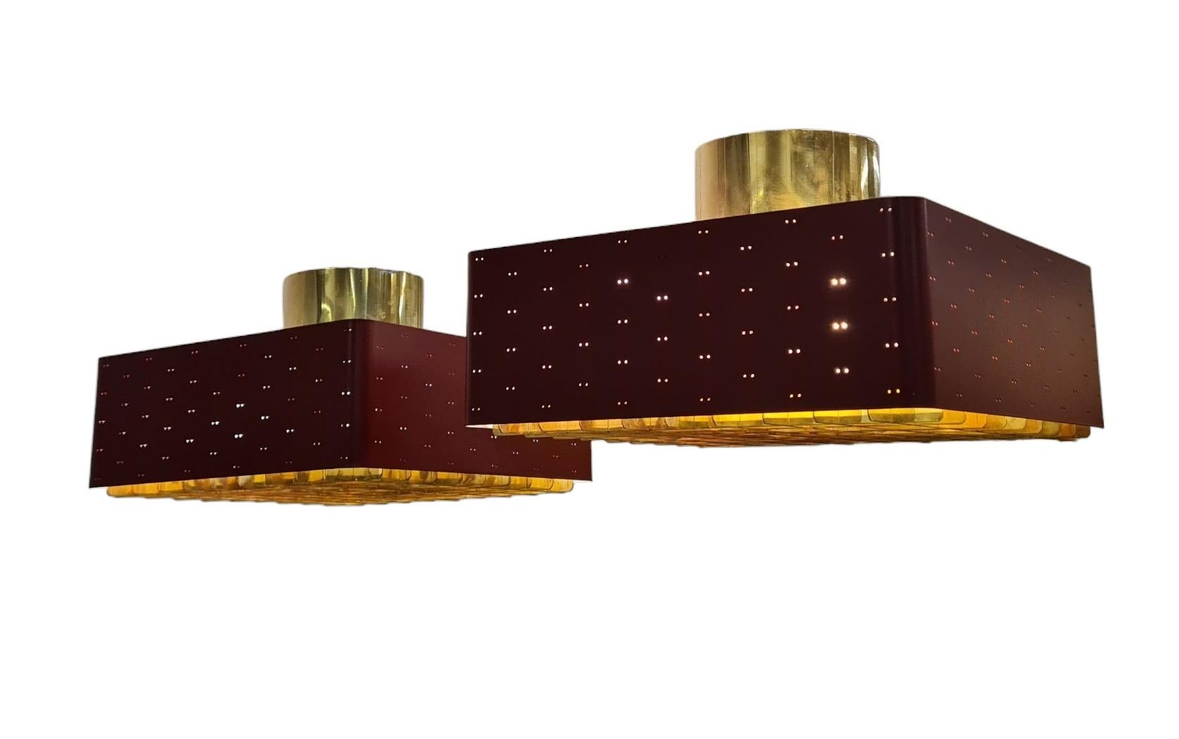 The Starry Sky is one of the most iconic designs of Paavo Tynell's lamps. It was made by both Taito and Idman in many different sizes. The way the light filters through the grill and the holes on the sides makes the ceiling look like a starry sky.